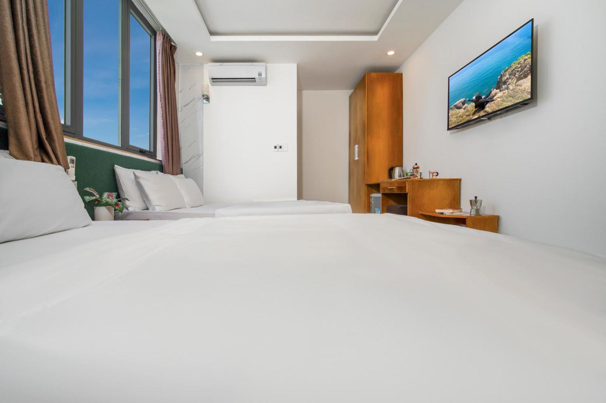 Trang Ngan Hotel By Thg Дананг Екстер'єр фото